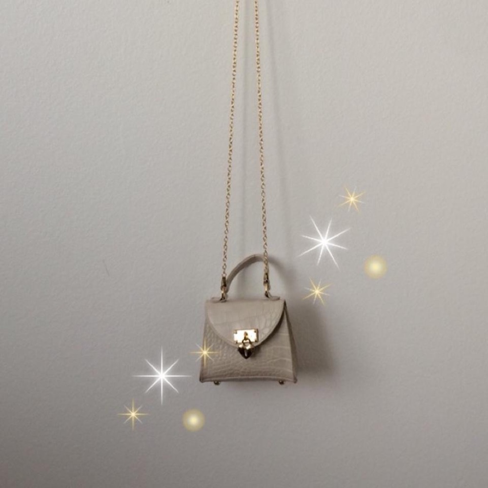Never been worn small new tiny faux crocodile bag with chain and heart lock